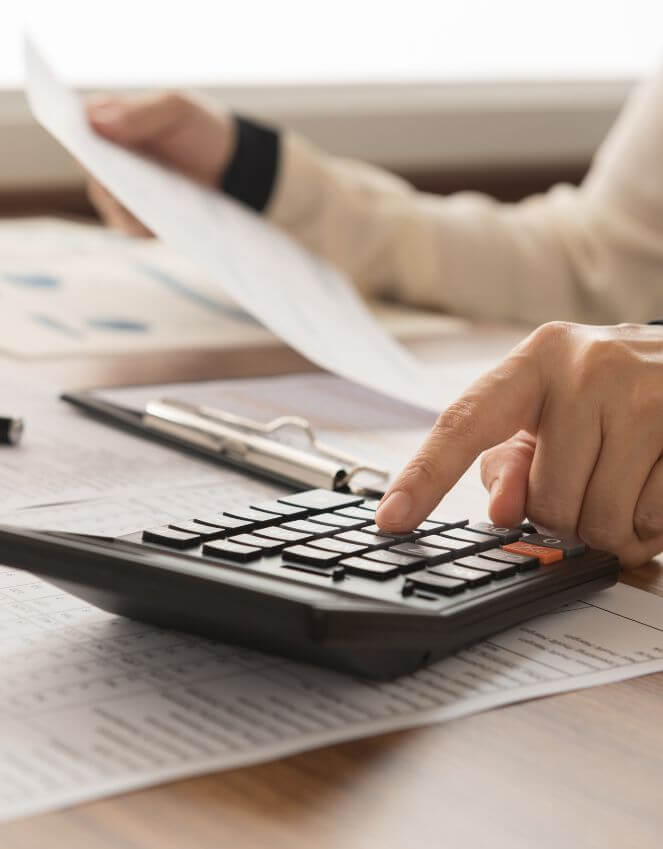 Business owner reviewing cash flow and tax planning strategy with a professional advisor